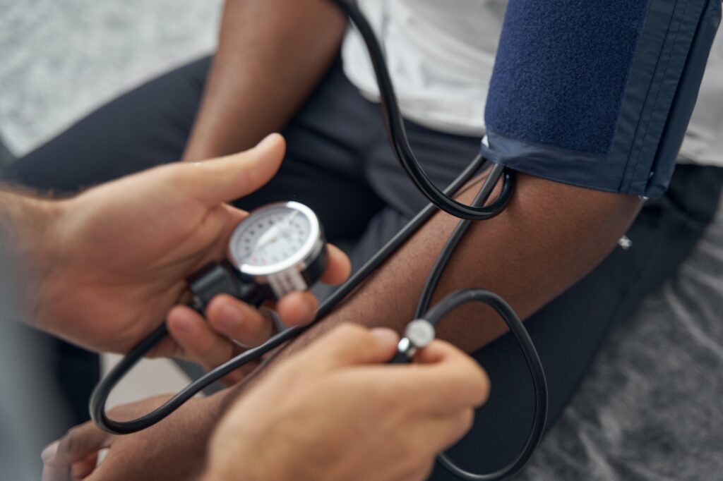 African American patient undergoing routine medical check-up